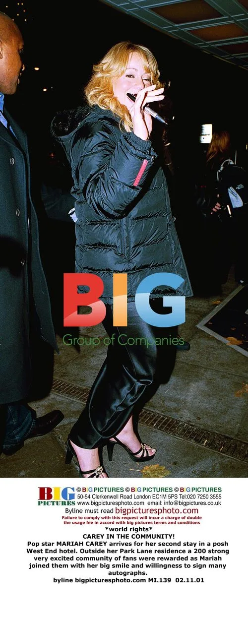 Mariah Carey Greets Fans Outside Hotel