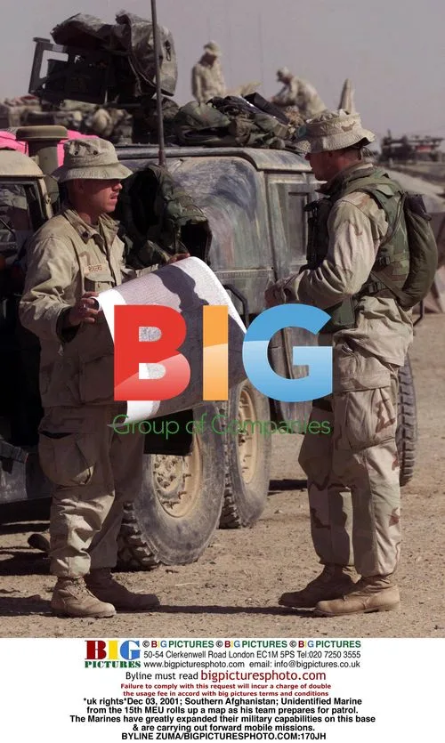 Marine Prepares for Patrol in Afghanistan