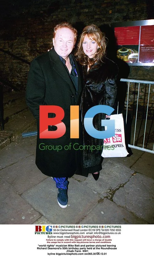 Mike Batt and partner at Richard Desmond's 50th birthday party