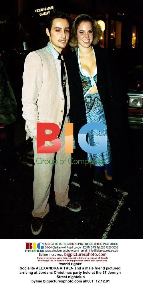 Alexandra Aitken and friend arrive at Christmas party