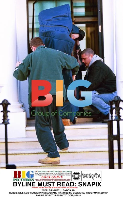 Robbie Williams' Piano Delivery