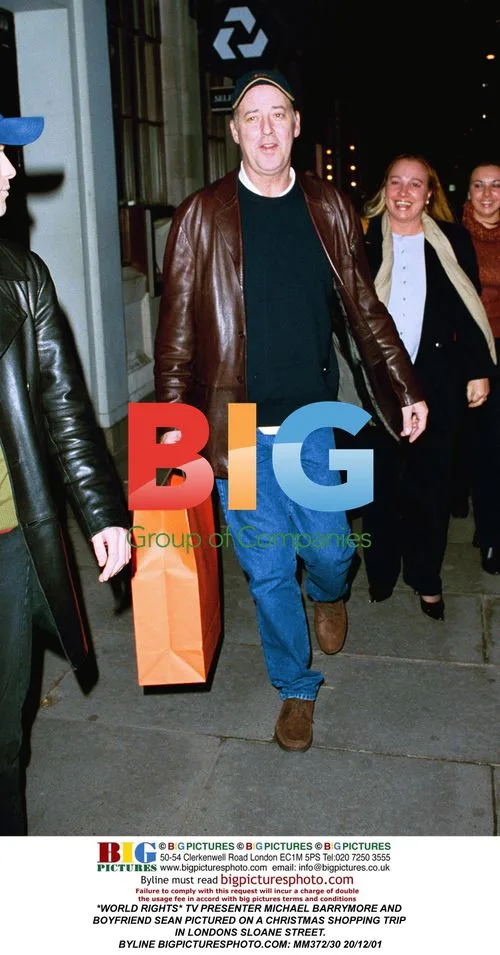 Michael Barrymore and boyfriend Sean on Christmas shopping trip