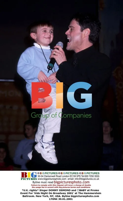 Donny Osmond and baby at Broadway event