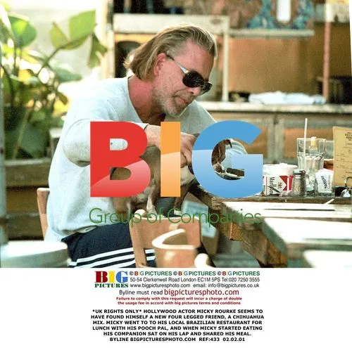 Mickey Rourke Dines with Chihuahua Mix