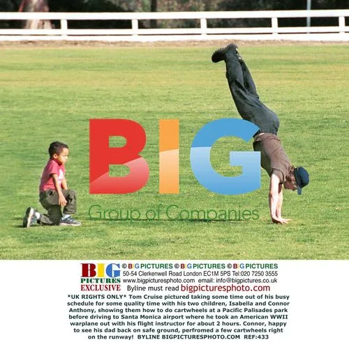 Tom Cruise with children in park