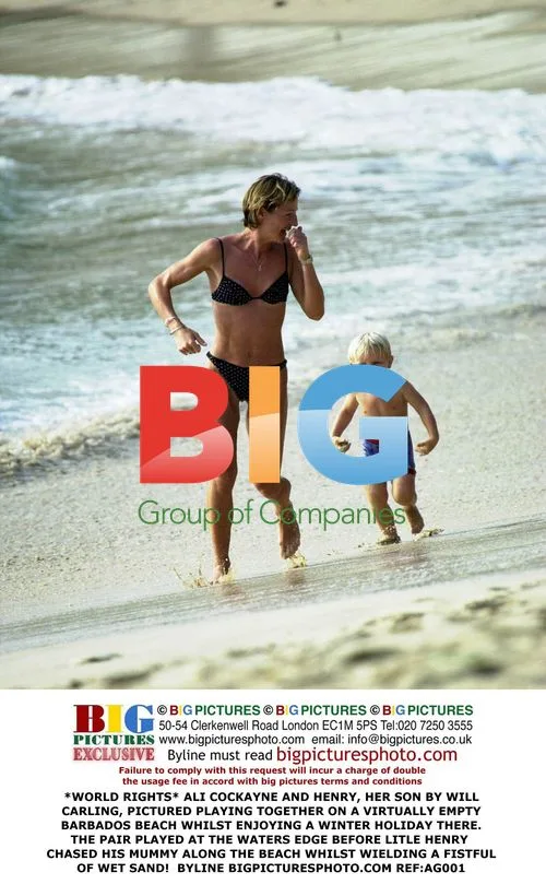 Ali Cockayne and Son Henry Play on Barbados Beach