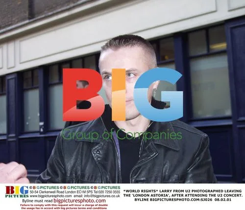 LARRY FROM U2 PHOTOGRAPHED LEAVING LONDON ASTORIA