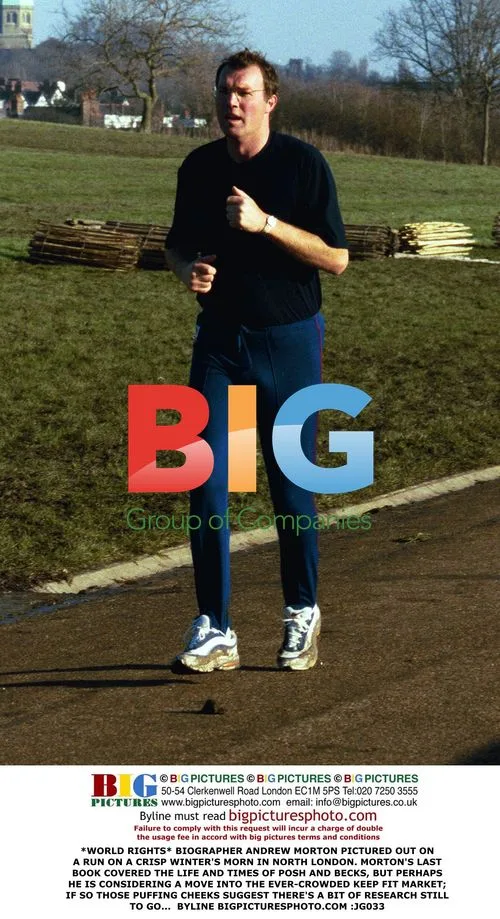 Andrew Morton pictured jogging in London
