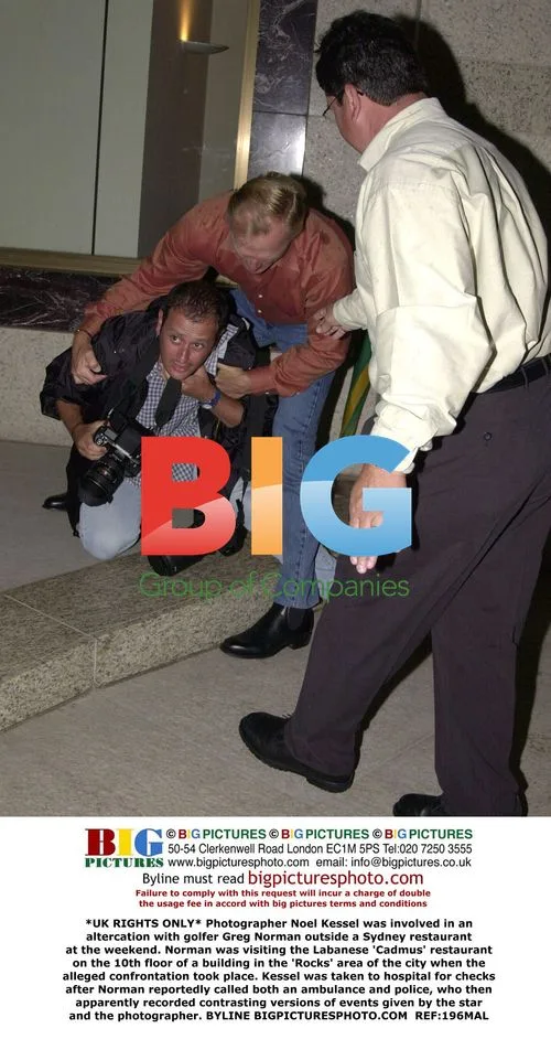 Photographer in altercation with Greg Norman