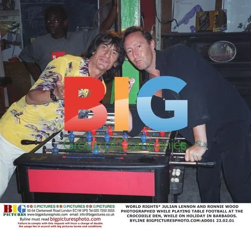 Julian Lennon and Ronnie Wood play table football