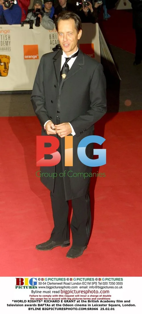 RICHARD E GRANT at the BAFTAs in London