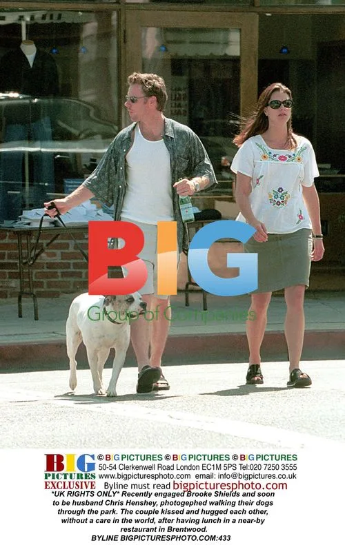 Brooke Shields and Chris Henshey walk dogs