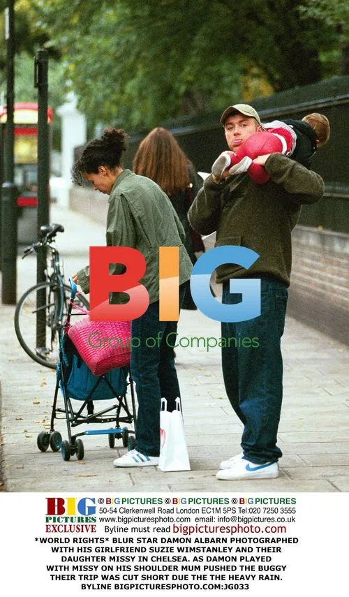 Damon Albarn with Girlfriend and Daughter in Chelsea