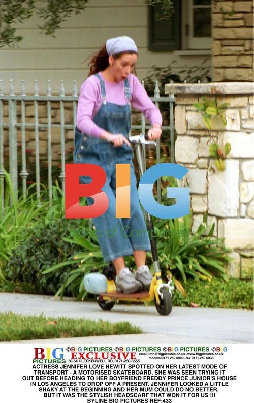 Jennifer Love Hewitt on Motorized Skateboard