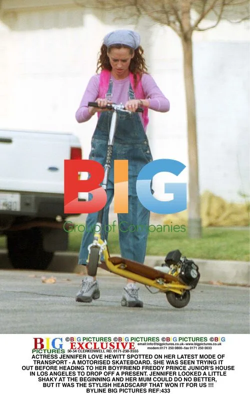 Jennifer Love Hewitt Rides Motorized Skateboard