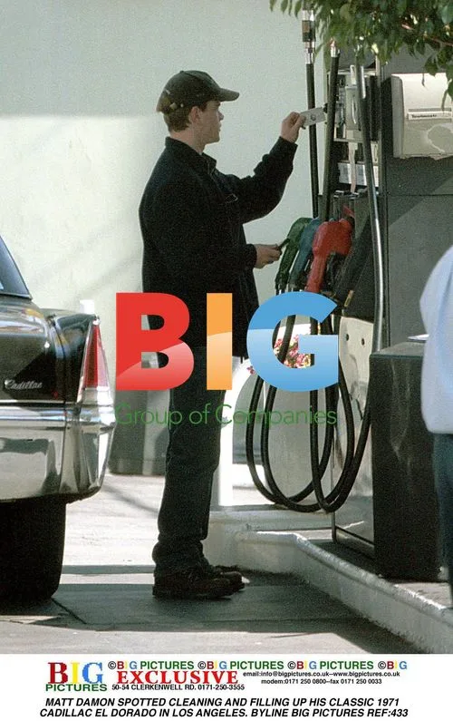 Matt Damon cleaning classic Cadillac