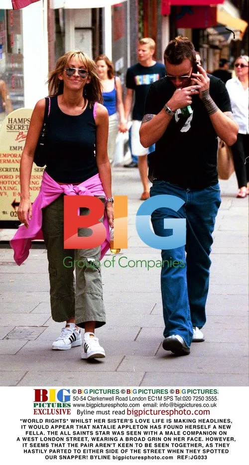 Natalie Appleton spotted with male companion