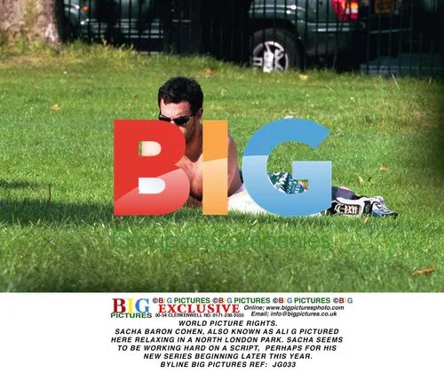 Sacha Baron Cohen Relaxing in Park