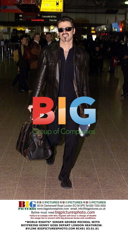 George Michael and Kenny Goss depart Heathrow
