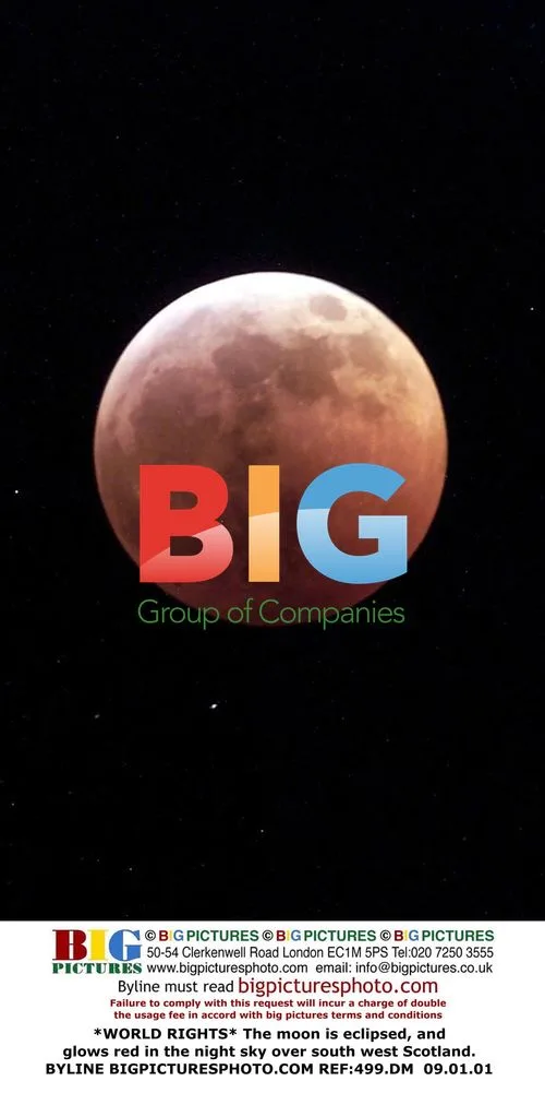 Lunar eclipse glows red over Scotland
