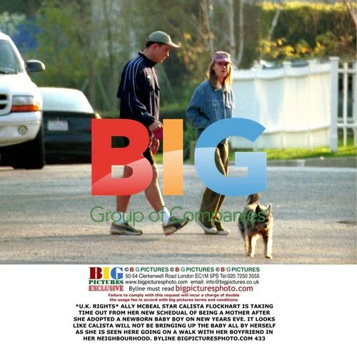 Calista Flockhart Takes Baby on Neighborhood Walk