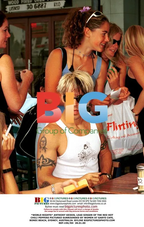 Anthony Keidis surrounded by women in Sydney