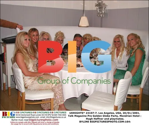 Hugh Heffner and Playmates at Talk Magazine Party