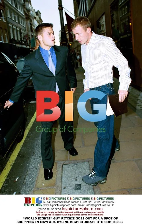 GUY RITCHIE GOES SHOPPING IN MAYFAIR