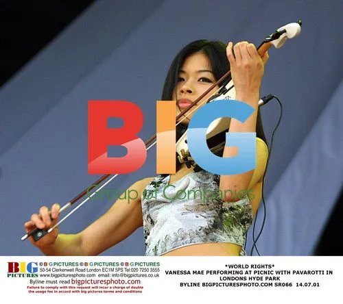 Vanessa Mae performs at Pavarotti Picnic in London