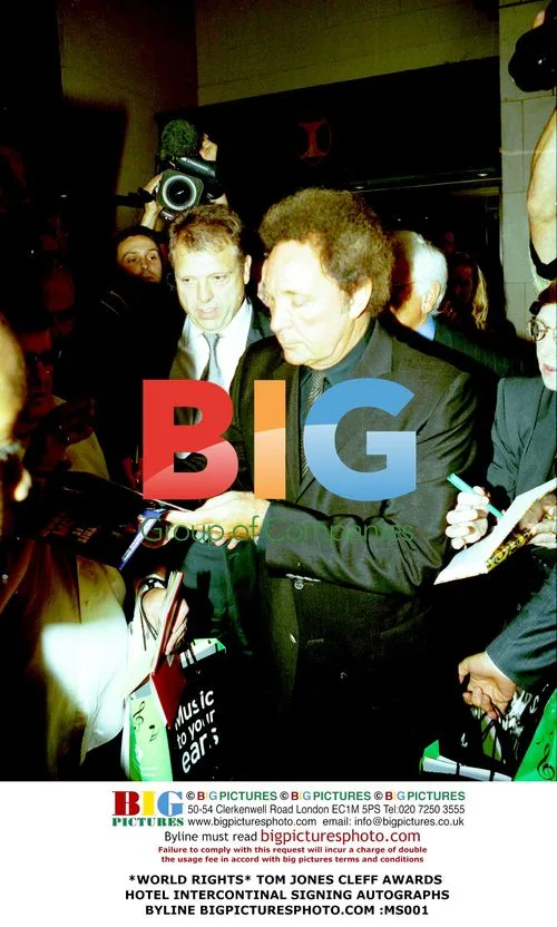 Tom Jones at Cleff Awards signing autographs