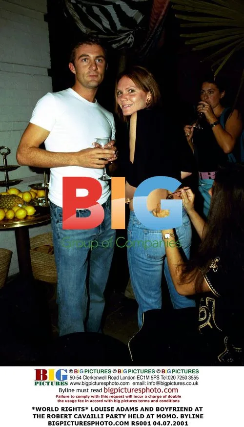 Louise Adams and Boyfriend at Robert Cavailli Party