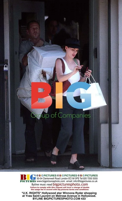 Winona Ryder Shopping at Yves Saint Laurent