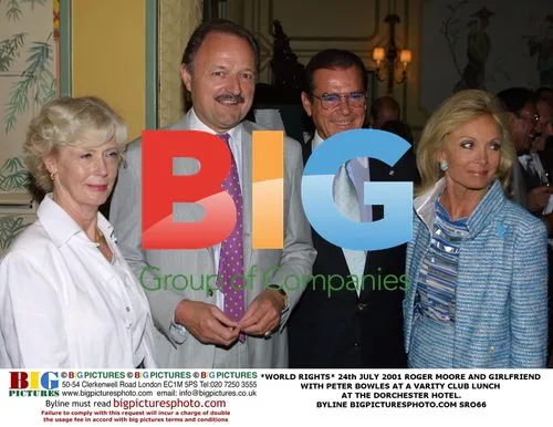 Roger Moore & Girlfriend at Varity Club Lunch