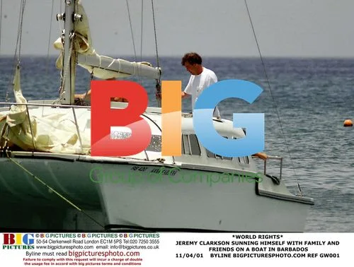 Jeremy Clarkson Relaxing on Boat in Barbados