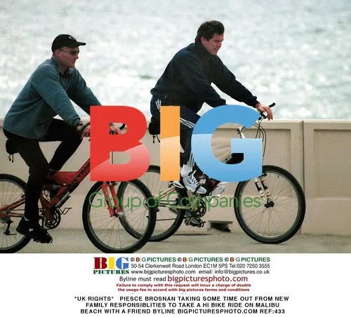 Pierce Brosnan Enjoys Bike Ride on Malibu Beach
