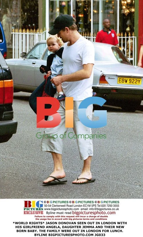 Jason Donovan Out with Family in London