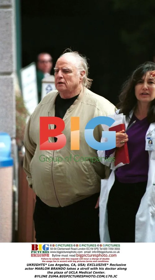 Reclusive Marlon Brando takes stroll with doctor