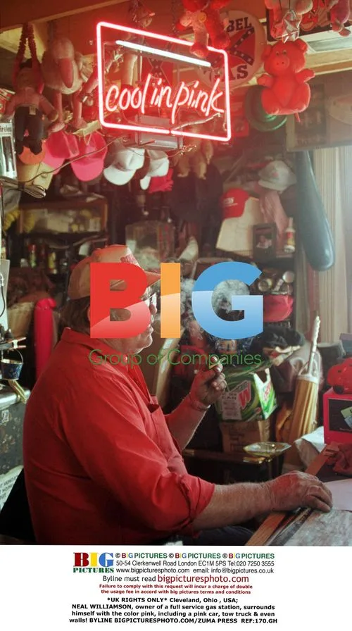 Gas station owner surrounds himself in pink