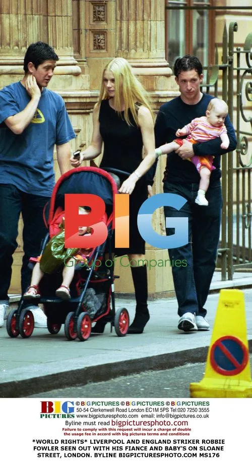 Robbie Fowler with Fiancée and Baby in London