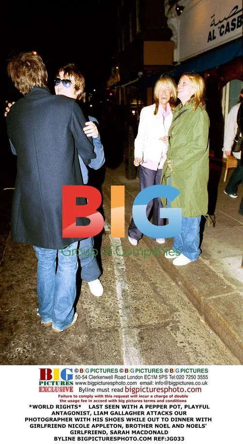 Liam Gallagher attacks paparazzi