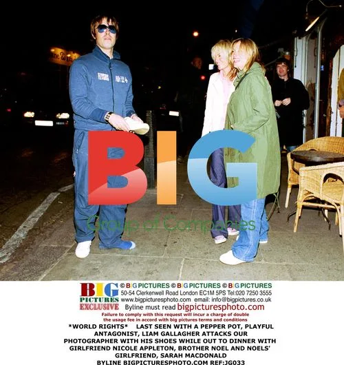 Liam Gallagher attacks photographer with shoes