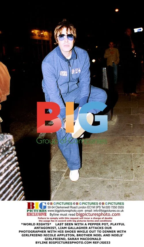 Liam Gallagher Attacks Photographer