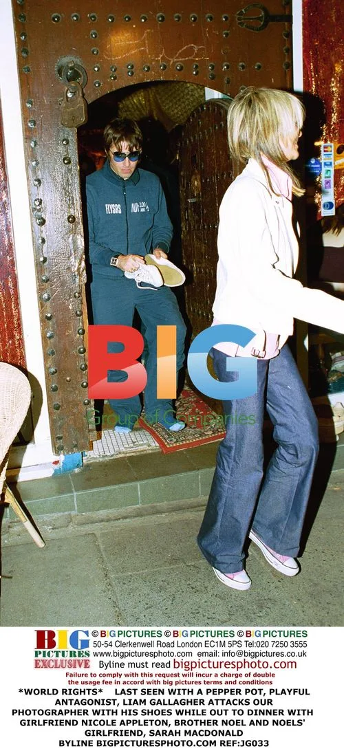 Liam Gallagher attacks photographer