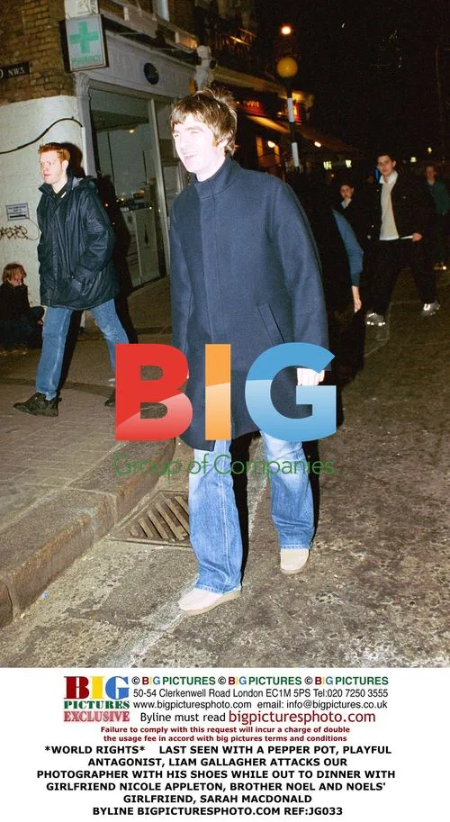 Liam Gallagher Attacks Photographer
