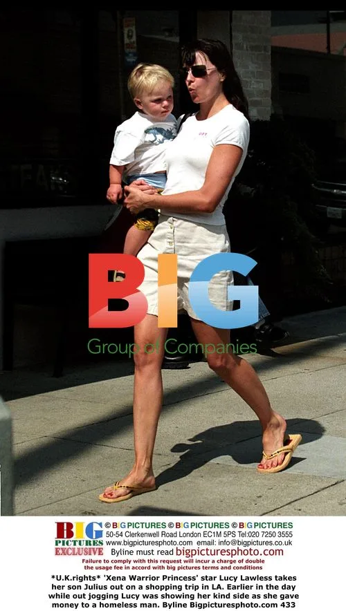 Lucy Lawless takes son shopping in LA