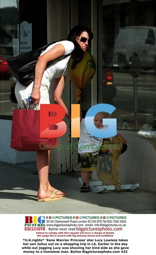 Lucy Lawless takes son shopping in LA