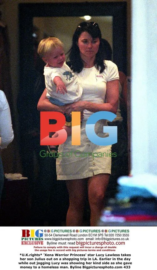 Lucy Lawless takes son shopping in LA