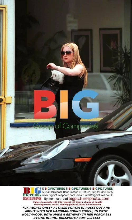 Portia di Rossi out with her dog in West Hollywood