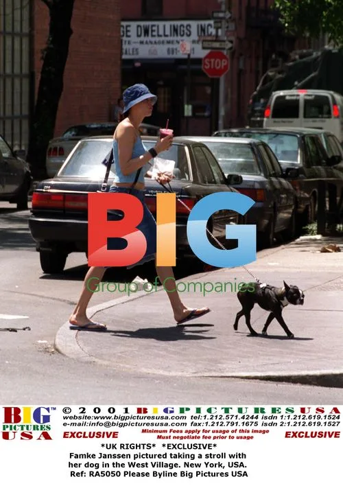 Famke Janssen strolling with dog in West Village