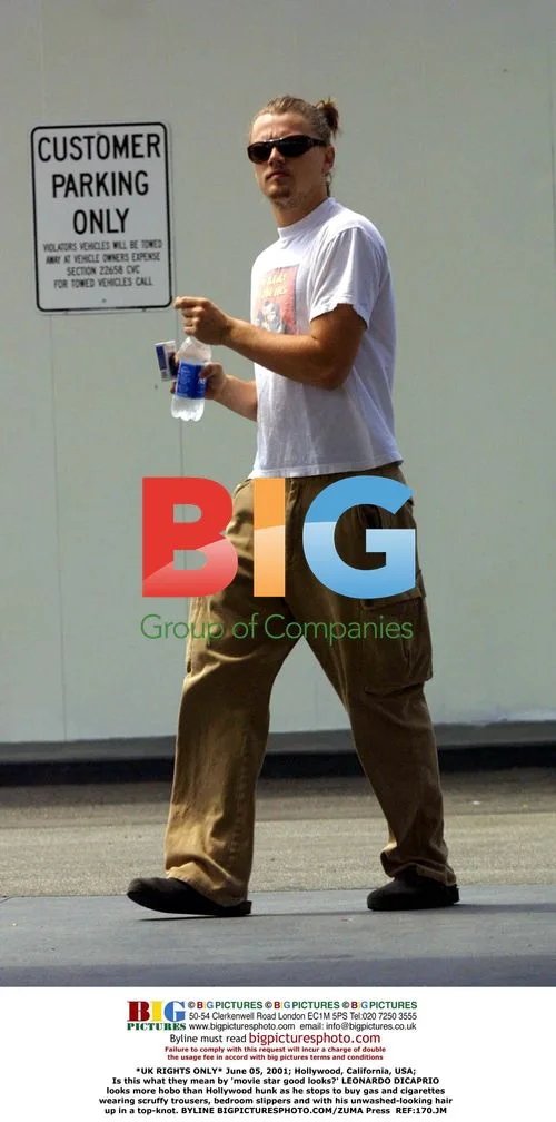 Unkempt Leonardo DiCaprio stops for gas